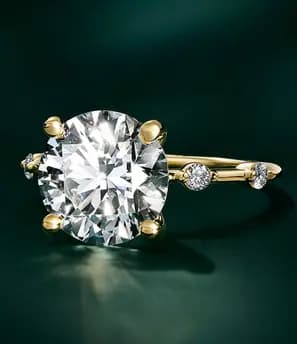 Hands crafting jewelry with precision